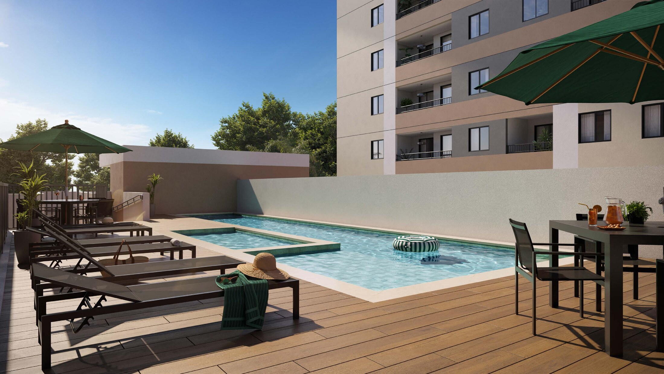 Piscina com deck e espreguiçadeiras — Residencial Maro by BP8